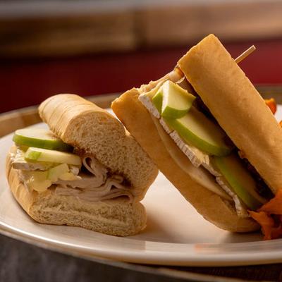 Turkey Bam Brie Lam & Fig Jam sadnwich, close up.