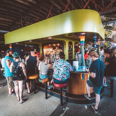 Interior, guests at the front bar