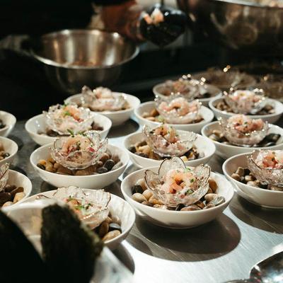 Bowls with shrimp appetizers.