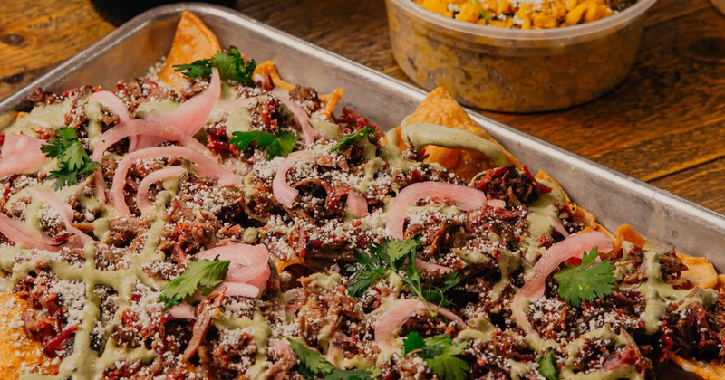 BBQ plate with a plate of side dishes