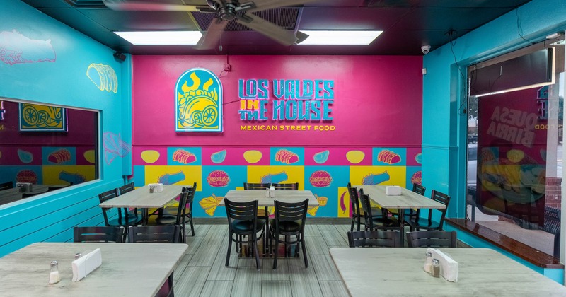 Interior, tables and chairs ready for guests