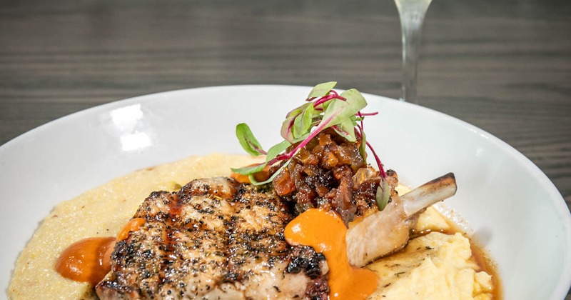 Duroc Pork Chop plate and a cocktail drink