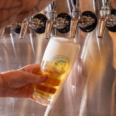 Pouring beer from the tap.