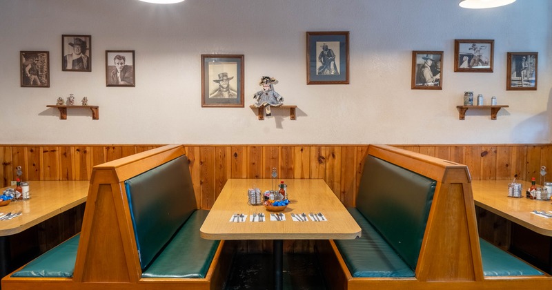 Restaurant booth seating with wooden paneling