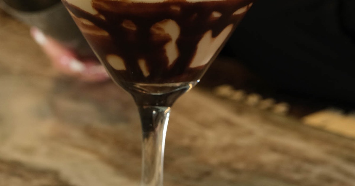 Chocolate cocktail being poured