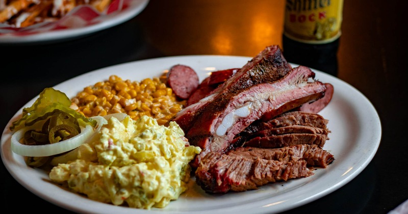 Ribs, with potato salad, and corn