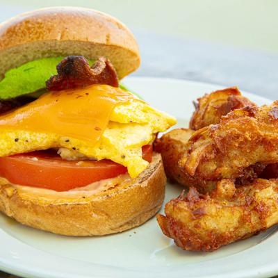 Bacon and egg sandwich, and cheesy hash brown fritters.