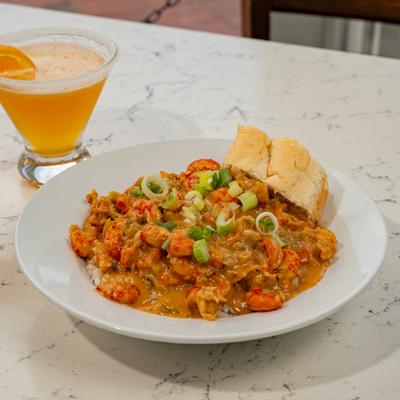 Crawfish Etouffee and a drink.
