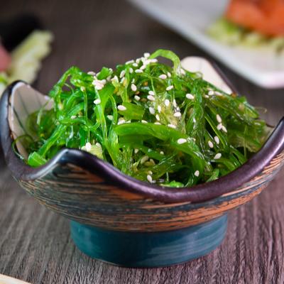 Seaweed salad garnished with sesame seeeds.