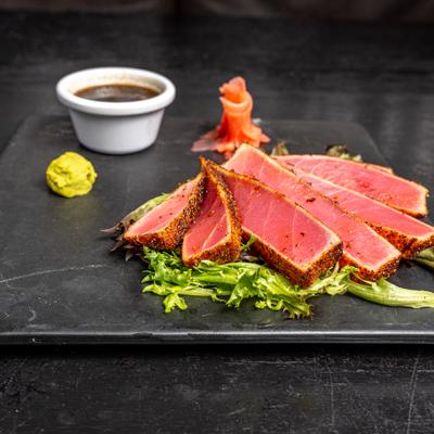 Blackened tuna served with soy sauce, pickled ginger and wasabi.