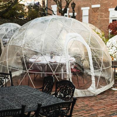 Outdoor dining igloos on the restauran's patio.