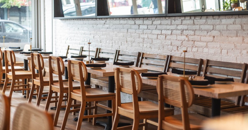 Dining space, wooden tables and chairs
