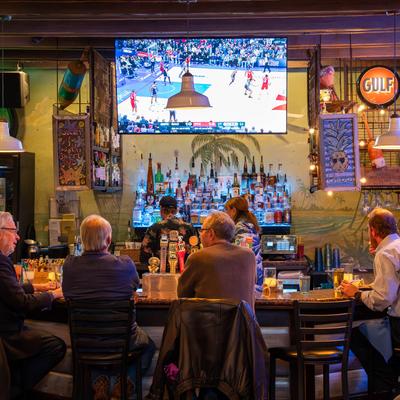 Photo showing our main bar as well as TV screen..