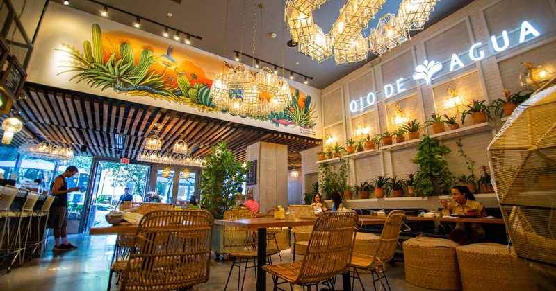 Interior, dining area and logo on the right wall