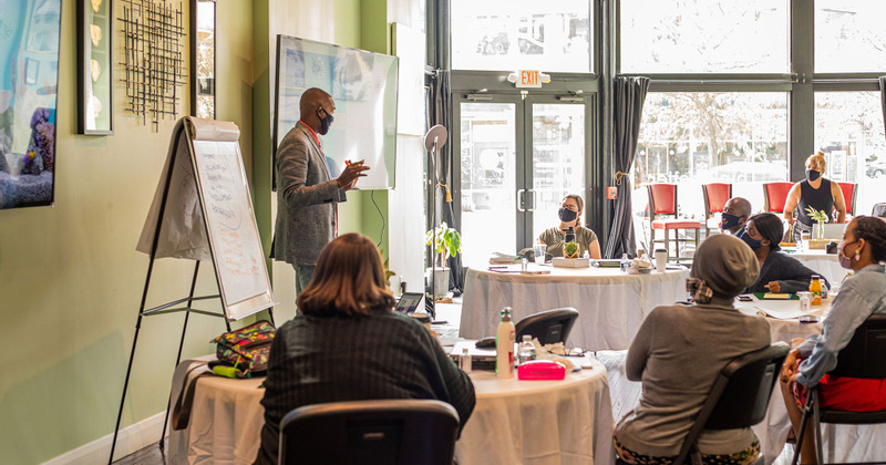 Interior, a man giving a lecture