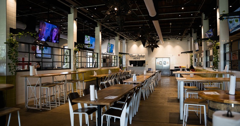 Interior, tables and chairs in main seating area