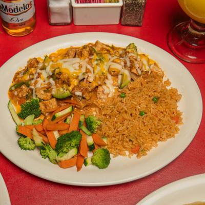 Mexican chicken dish with melted cheese, seasoned red rice, and steamed mixed vegetables.