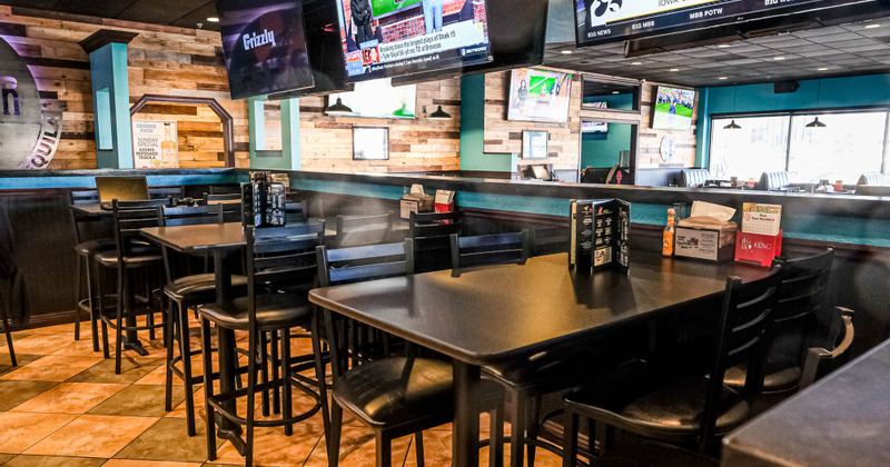 Interior, tables ready for guests