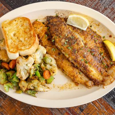 Seasoned Grilled Fish Fillets served with a Fresh Side Salad, Your Choice of Side & Garlic Bread.