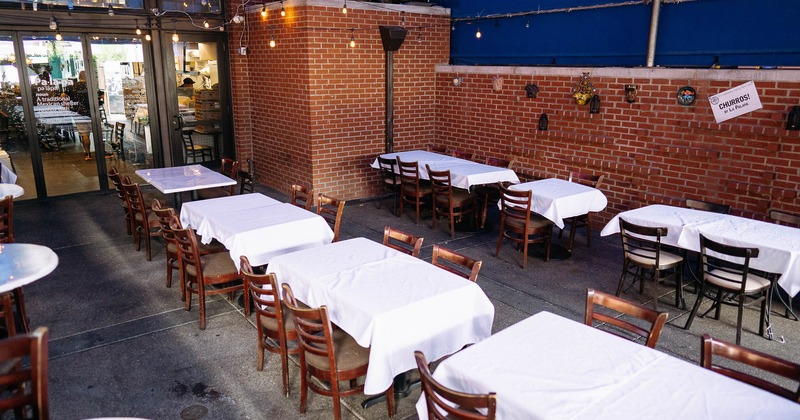Exterior, tables with white tablecloths