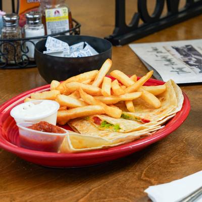 Quesadilla served with fries, sour creme and salsa.
