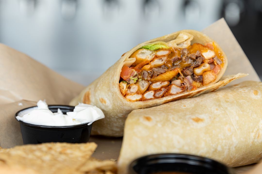 burrito with sour cream on the side