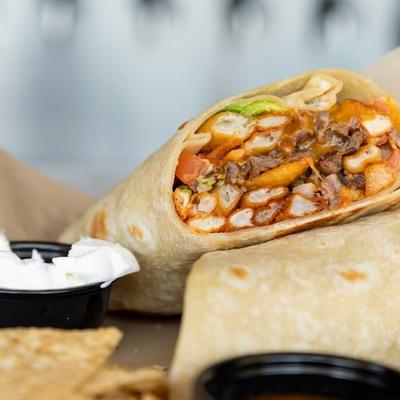 burrito with sour cream on the side.