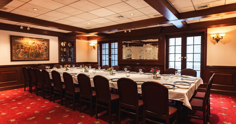 Interior, big table ready for guests