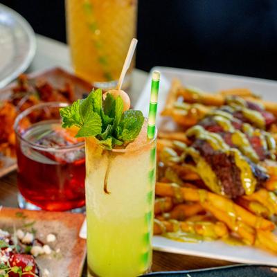 A table with food and cocktails.