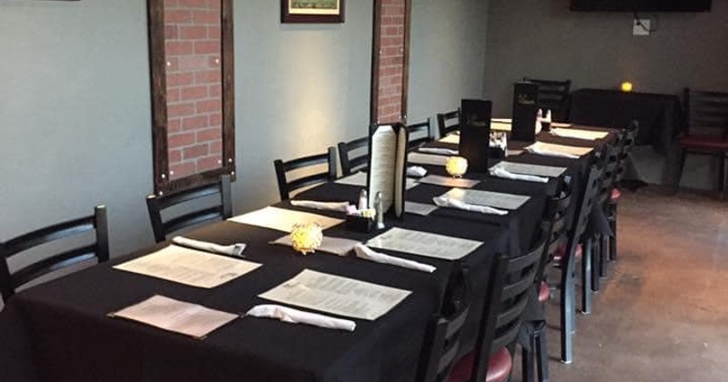 Interior, seating area, tables ready for guests