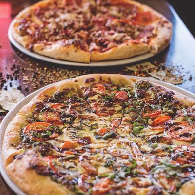 Different pizzas served on the table