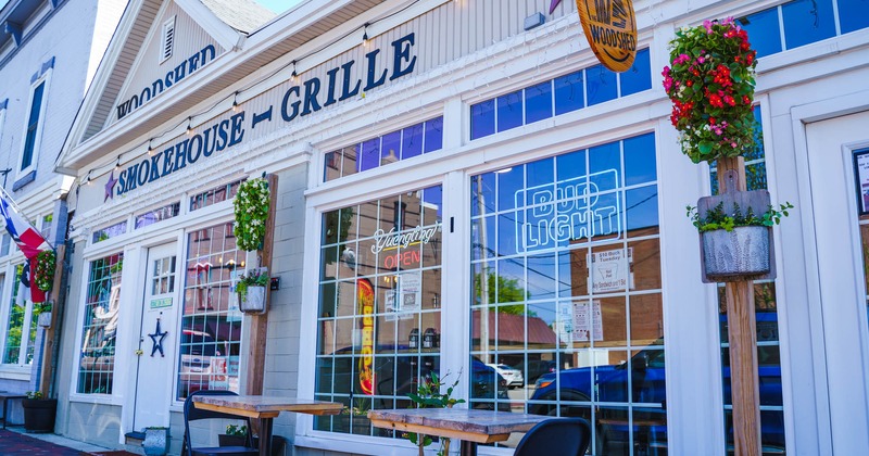 Exterior, entrance, table and chairs in front