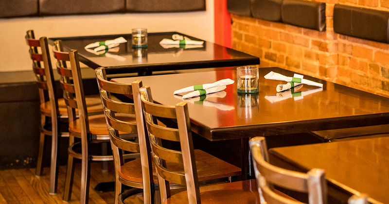 Interior, tables ready for guests, closeup