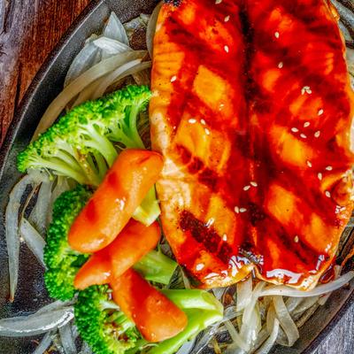 Grilled chicken with teriyaki sauce, carrots, and broccoli.