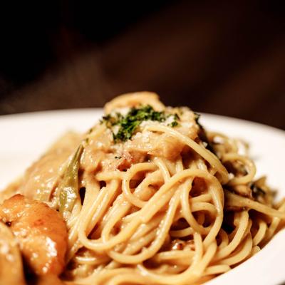 Spaghetti Carbonara served on a plate as a side dish, close-up.