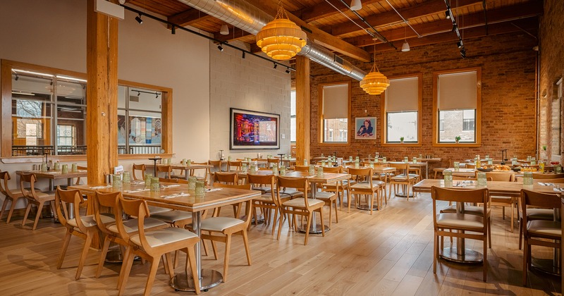 Restaurant interior, dining area, lined up dining tables