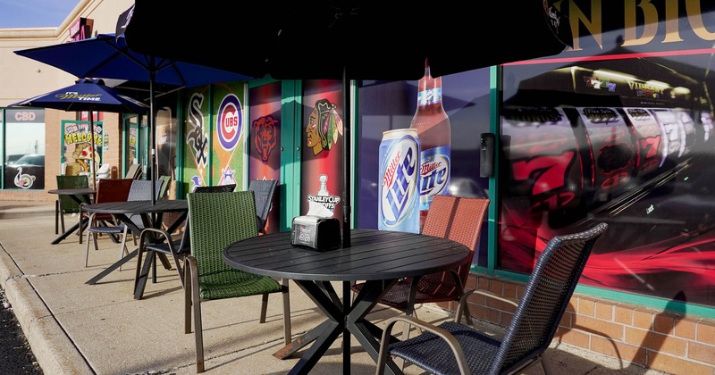 Exterior, tables and chairs all lined up