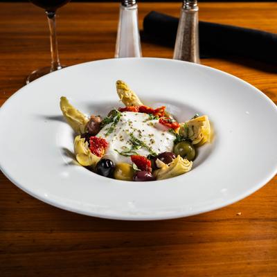 Burrata and mozzarella, with marinated artichoke hearts, tomato, and olives.