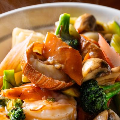 Seafood clay pot, close up.