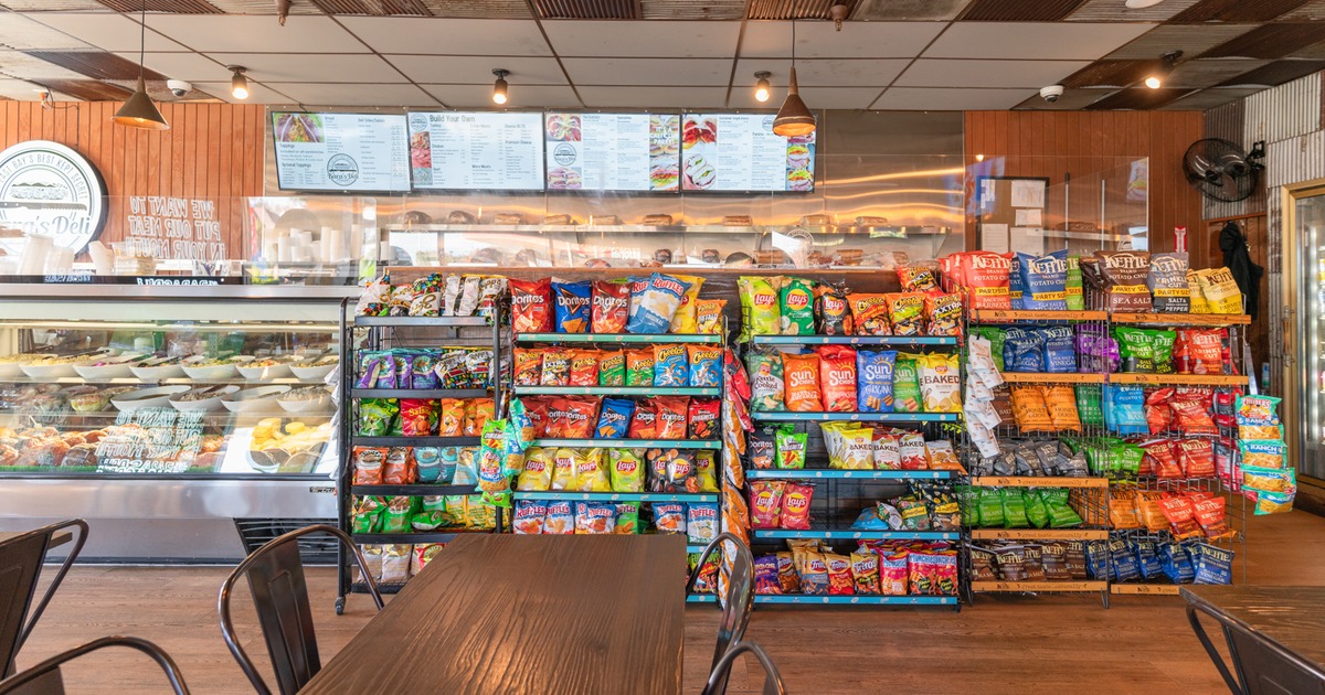 Interior, diner table, food counter above