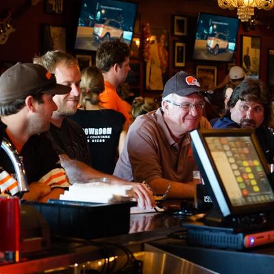 Fans watching the game and hanging around the bar