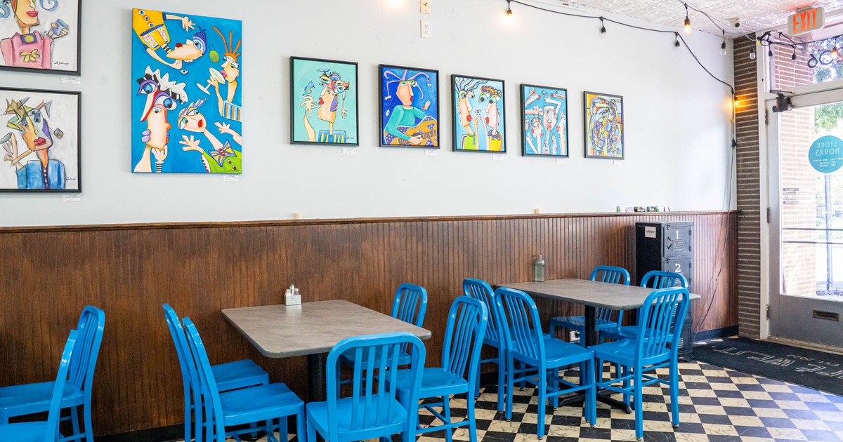 Interior seating area with chairs and tables