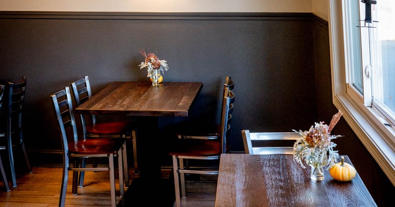 Interior, tables and chairs ready for guests