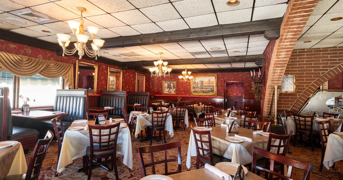 Interior, seating area, booths, chandeliers