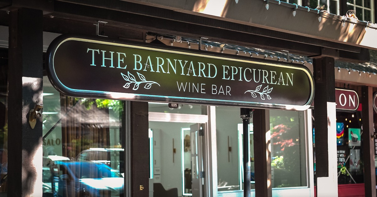 Restaurant front entrance with a sign above the door
