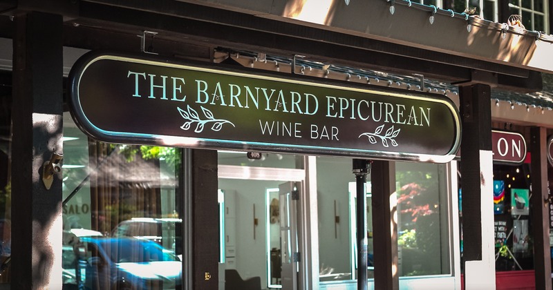 Restaurant front entrance with a sign above the door
