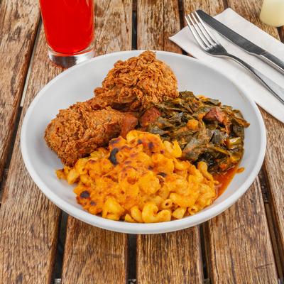 Crispy vegan chicken, vegan mac and cheese, and collard greens.