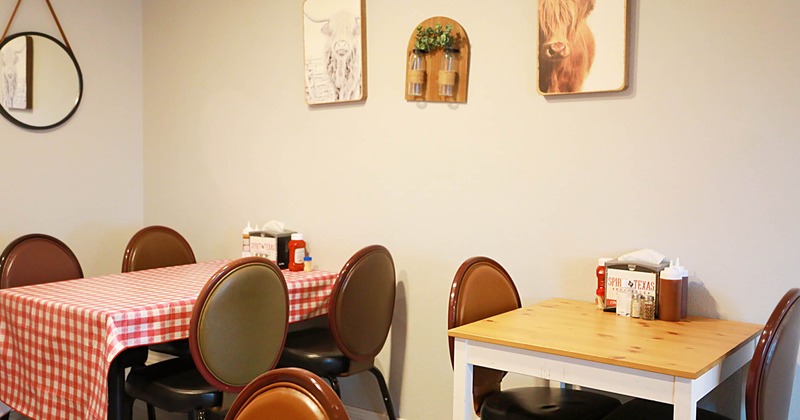 Tables and chairs, decoration on the wall