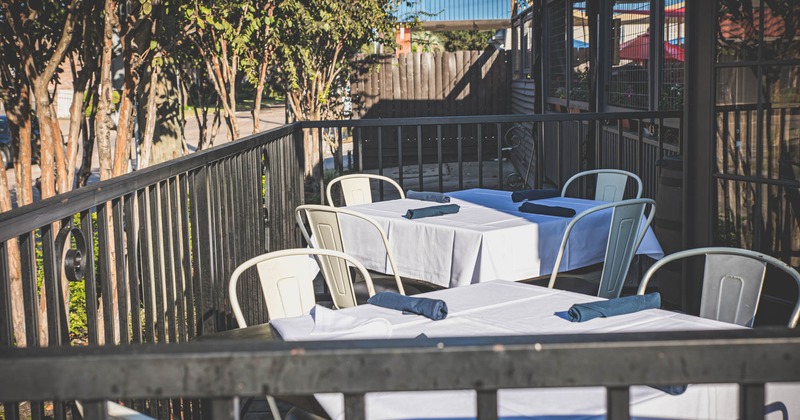 Outside, seating area, tables with white cloths