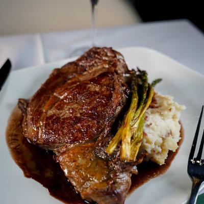 Ribeye steak, with mashed potatoes and grilled asparagus